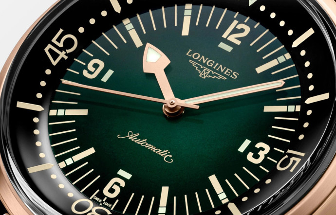Montre Longines Legend Diver, boîtier en bronze de 42 mm, mouvement mécanique à remontage automatique, fond en titane avec motif de plongeur gravé, étanche à 300 m, réserve de marche de 72 heures, bracelet en cuir et/ou tissu. 2 770 €. www.longines.com