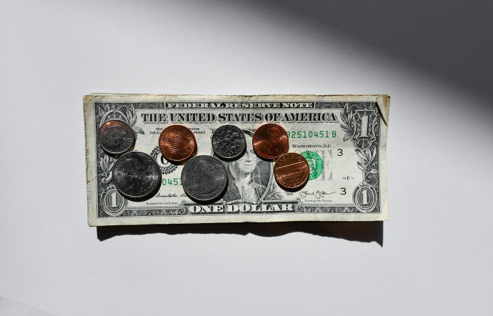 pourboire money dollar pièce