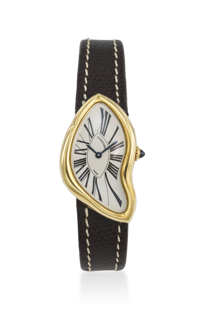 La montre Crash de Cartier (lot 12).