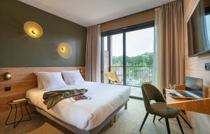 Une chambre à l’hôtel du Bout du Parc.